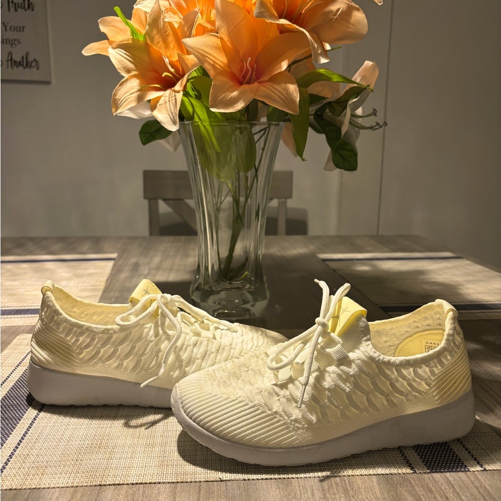 All white Danskin slip on sneakers